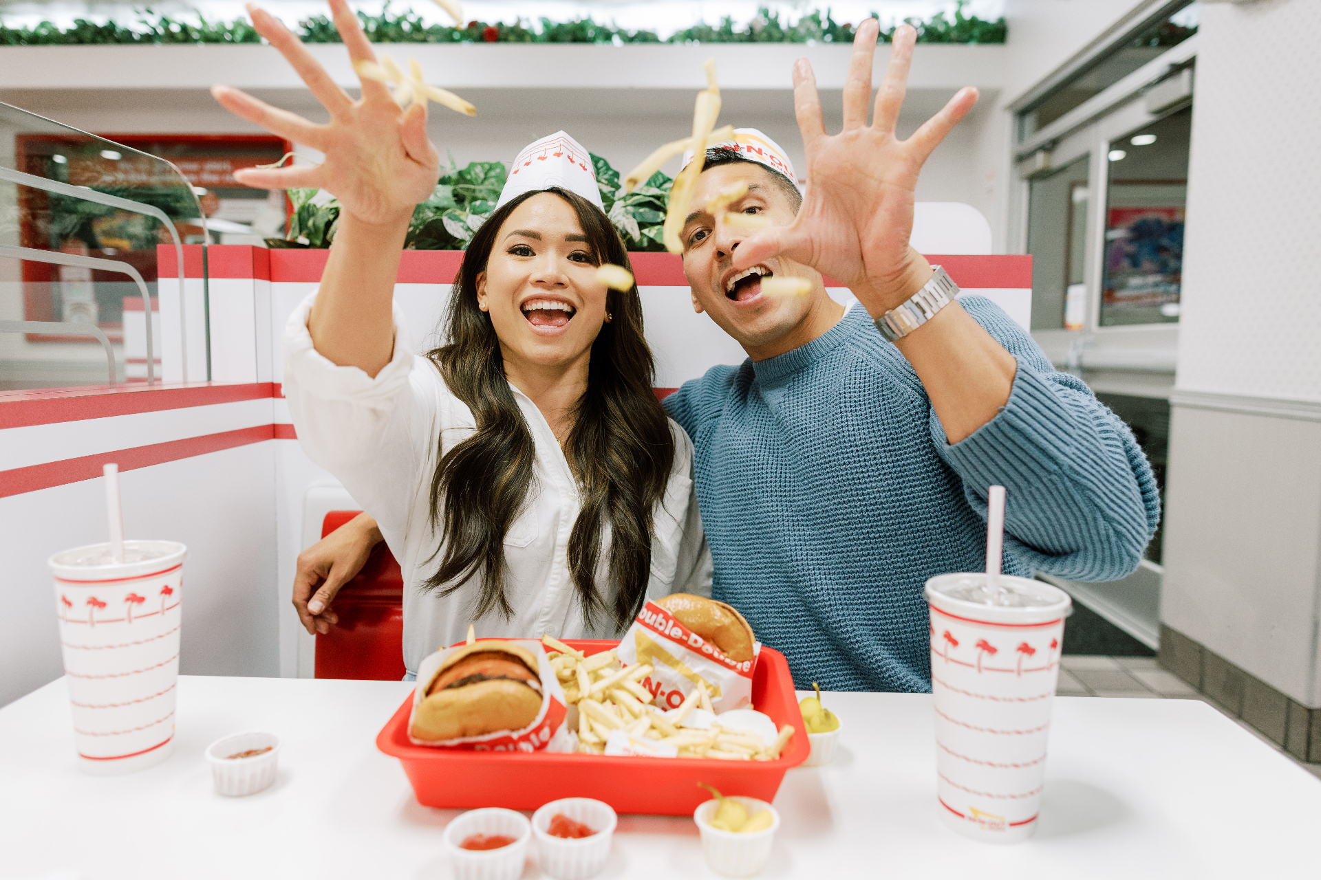 Mar and Virginia tossing fries